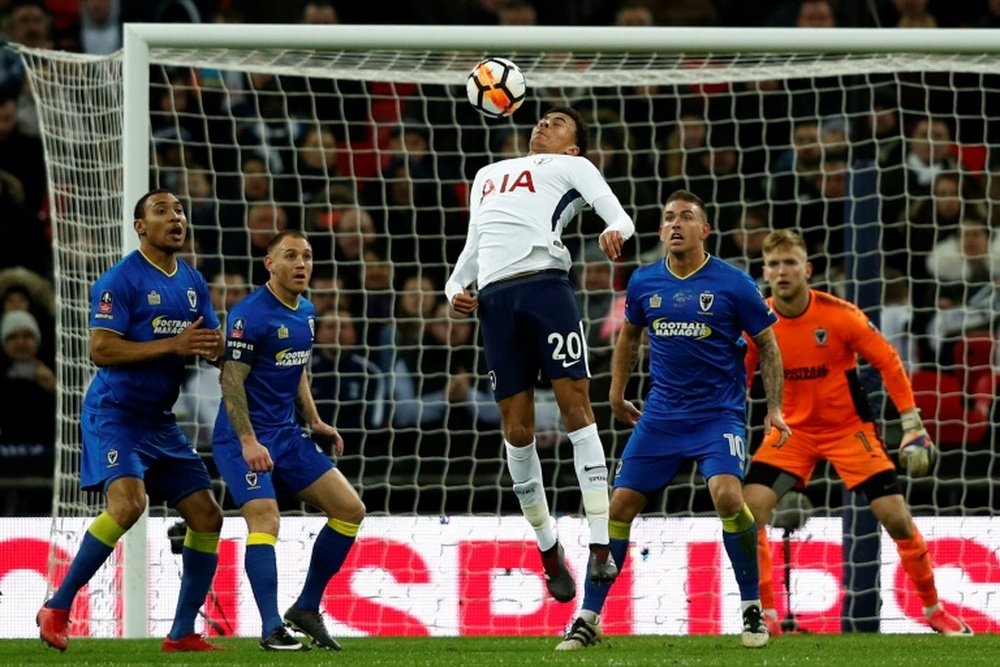 Spurs cruised to victory over AFC Wimbledon. AFP