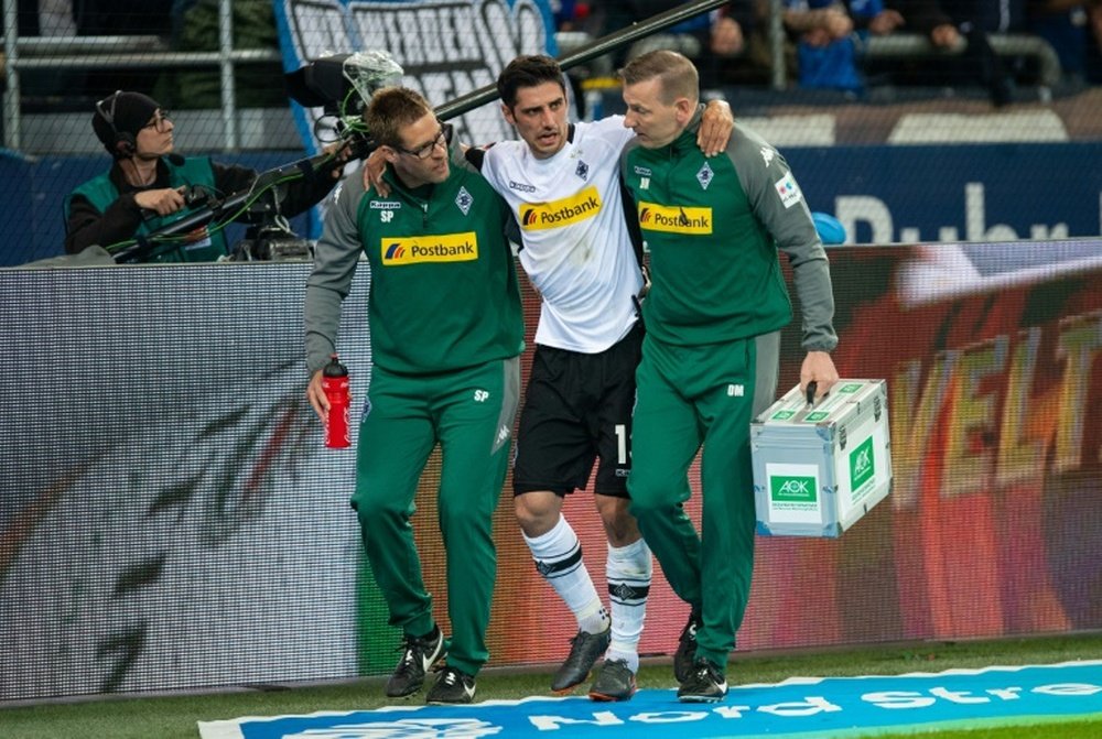 Stindl sustained an ankle injury and had to be escorted off. GOAL