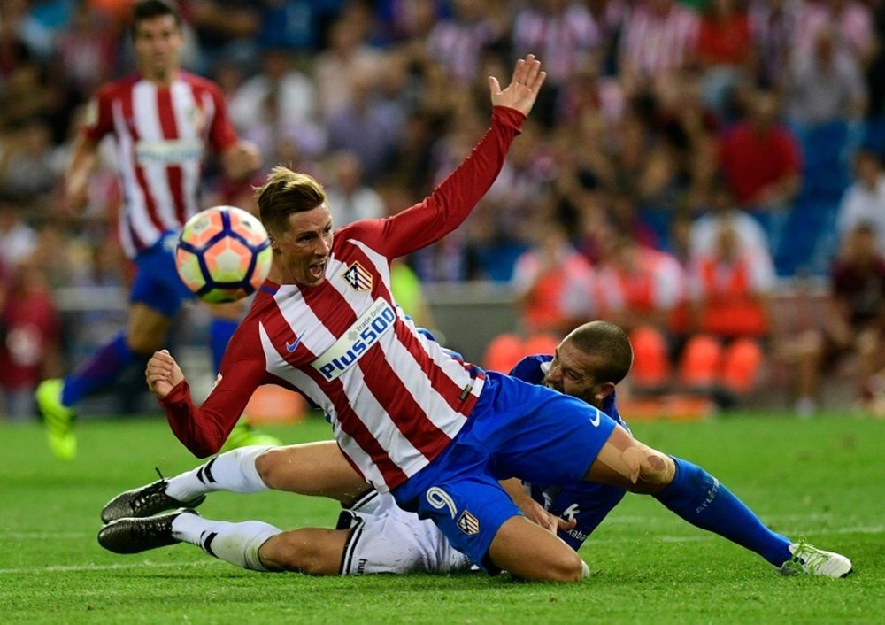 Torres marcó dos tantos y fue uno de los nombres propios del partido. EFE