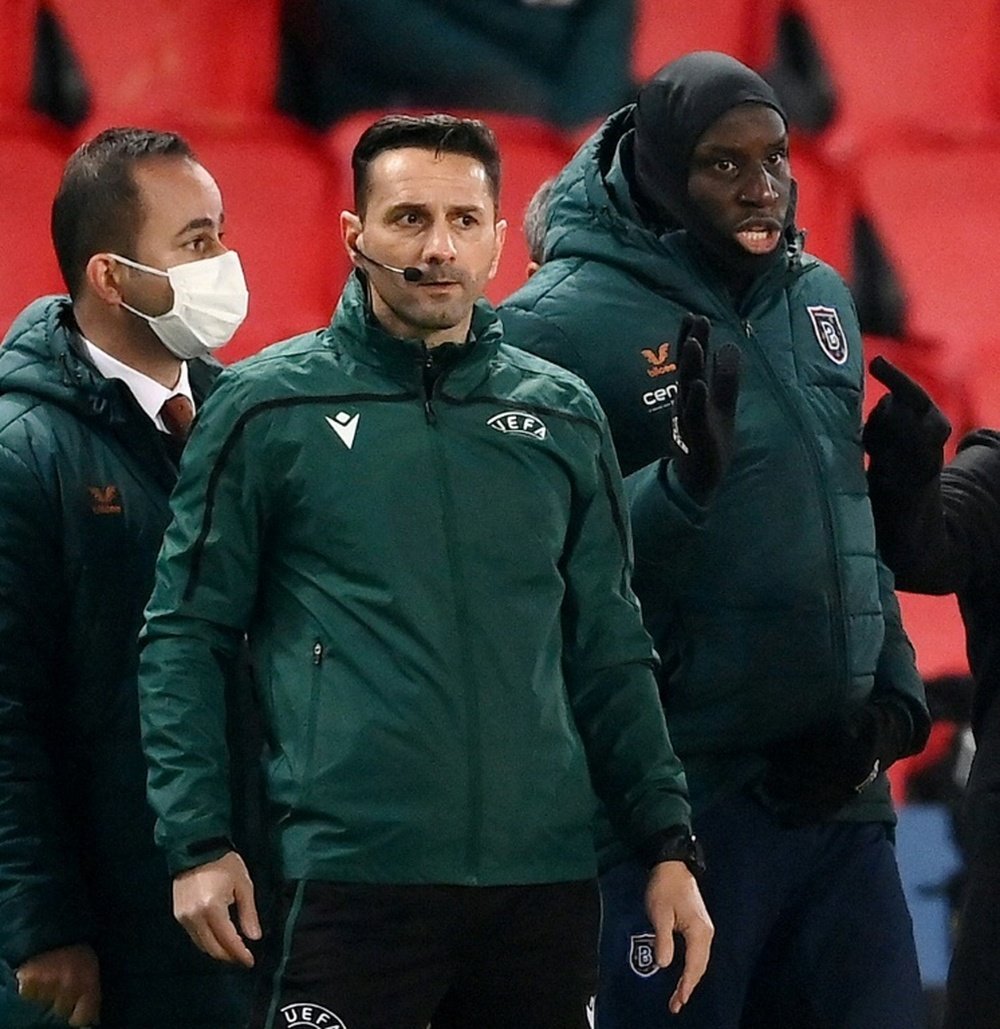 The 4th official in PSG v Baseksehir is back refereeing. AFP