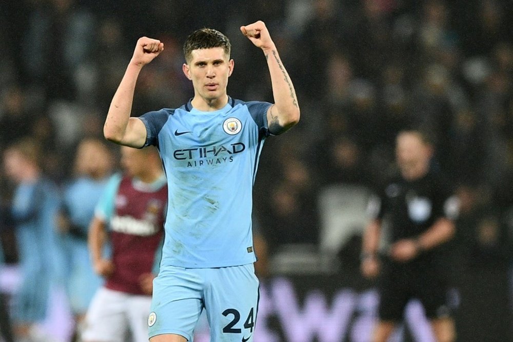 Stones believe England have the players to replicate Manchester City's brand of football. AFP