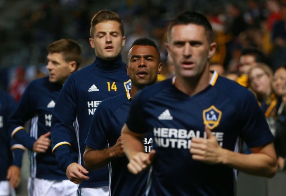 (From L) Steven Gerrard, Robbie Rogers, Ashley Cole and Robbie Keane of Los Angeles Galaxy warm up prior to their MLS match against DC United, at StubHub Center in Carson, California, on March 6, 2016