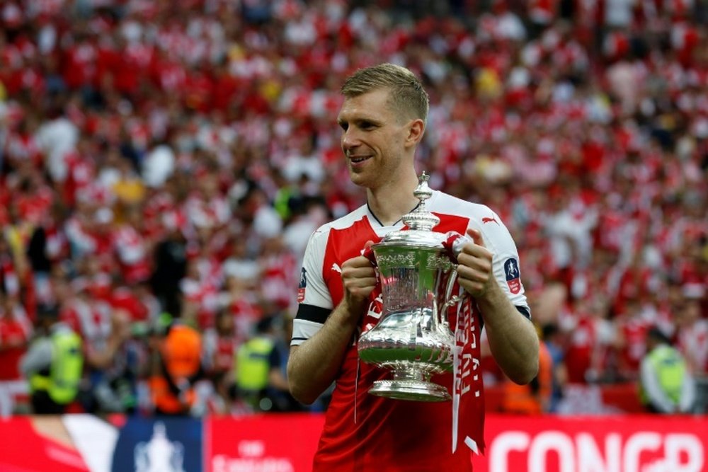 Per Mertesacker said talent is nothing without hard work. AFP