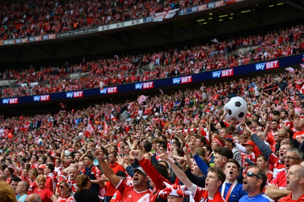 Middlesbrough fans wait for kick off of the English Championship play off final football match between Middlesbrough and Norwich City at Wembley Stadium in London on May 25, 2015