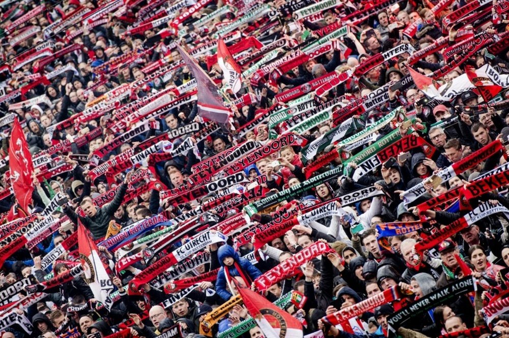 Feyenoord Rotterdam supporters celebrate during the ceremony of the Feyenoord Rotterdam selection in front of City Hall of Rotterdam, on April 25, 2016, after winning the Dutch KNVB Cup