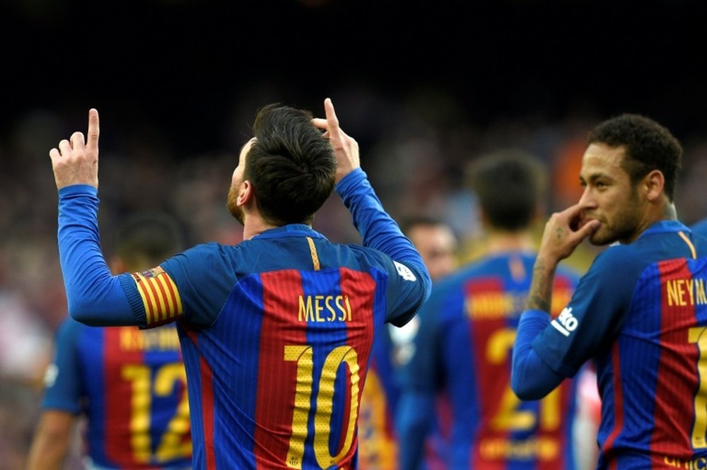 Barcelona's Leo Messi and Neymar. AFP