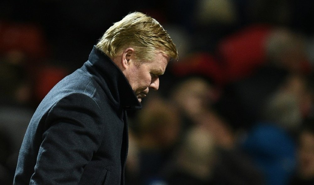 Koeman believes his side are too afraid to express themselves. AFP