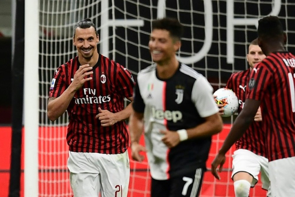 Ibra riu de Cristiano após marcar contra a Juventus. AFP