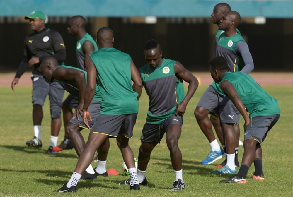 Senegals national football team players take part in a training session on January 4, 2017, at the Leopold Sedar Senghor stadium in Dakar, during preparations for the upcoming 2017 Africa Cup of Nations in Gabon