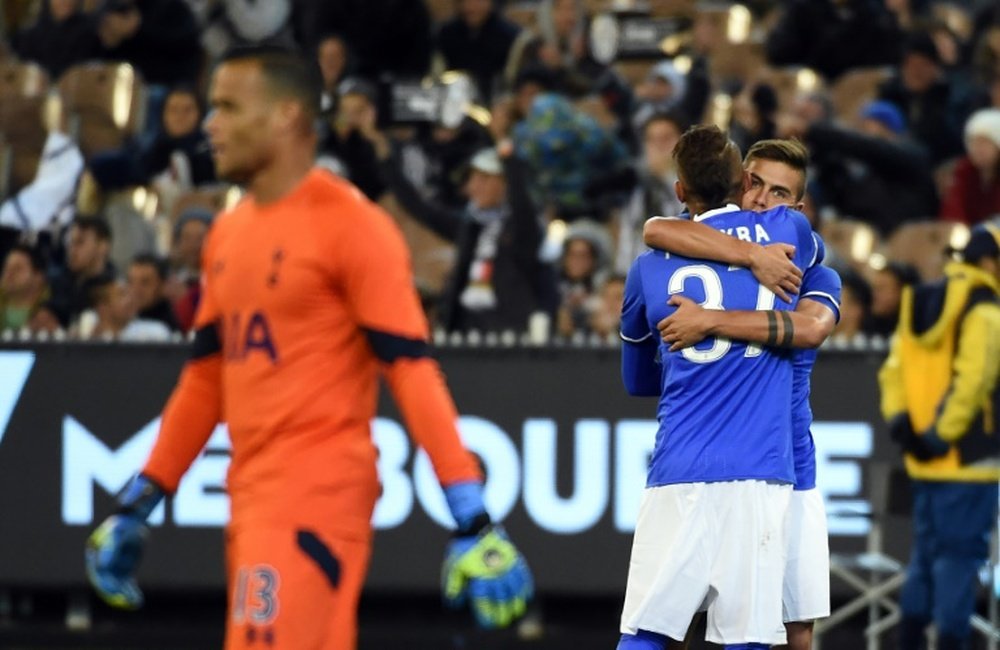 Juventus forward Paulo Dybala (right) celebrates his goal against Tottenham Hotspur in Melbourne.AFP