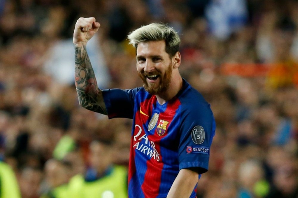 Messi celebrating a goal for Barca. AFP