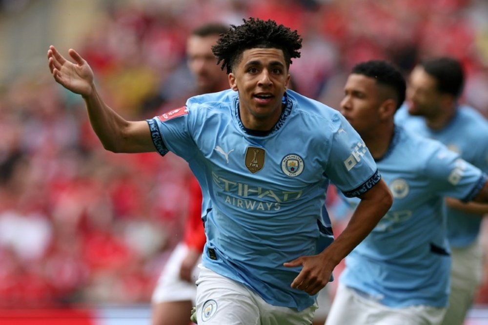 City will face Palace in the FA Cup final after beating Forest. AFP