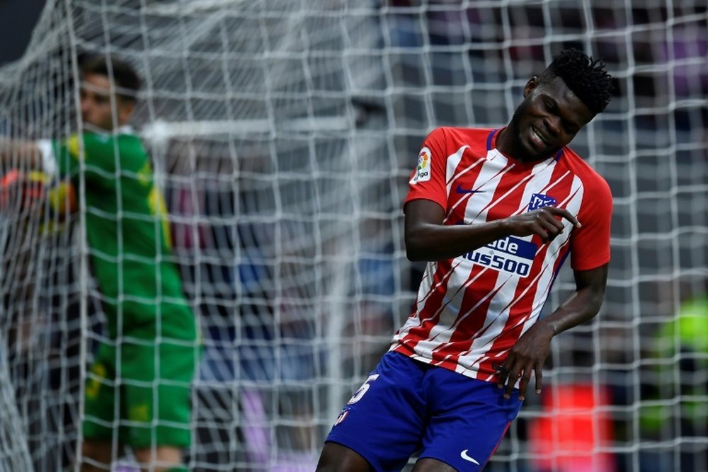 Thomas Partey has penned a new contract for Atletico. AFP