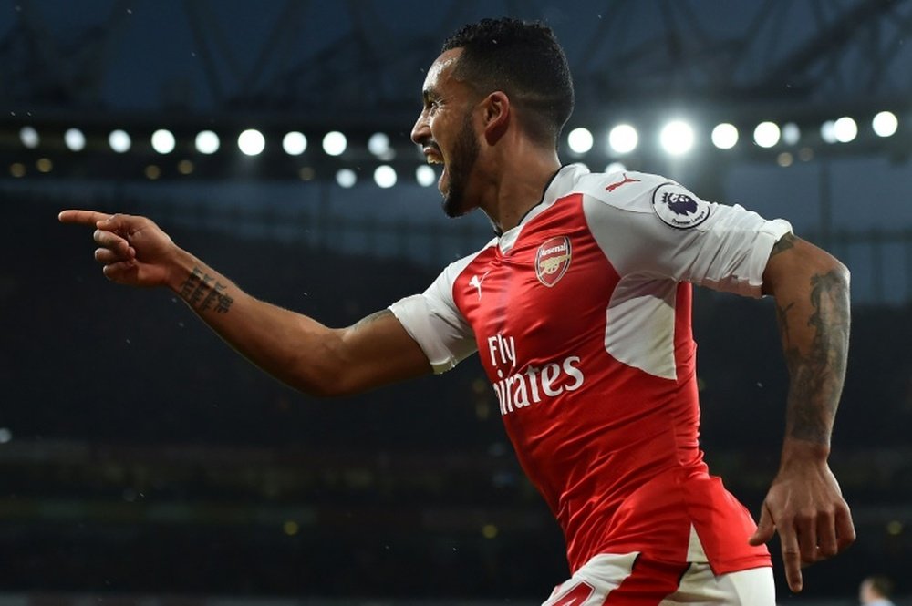 Walcott celebrates scoring for Arsenal. AFP