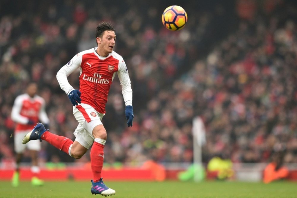 Ozil has emerged as a target for Barca. AFP
