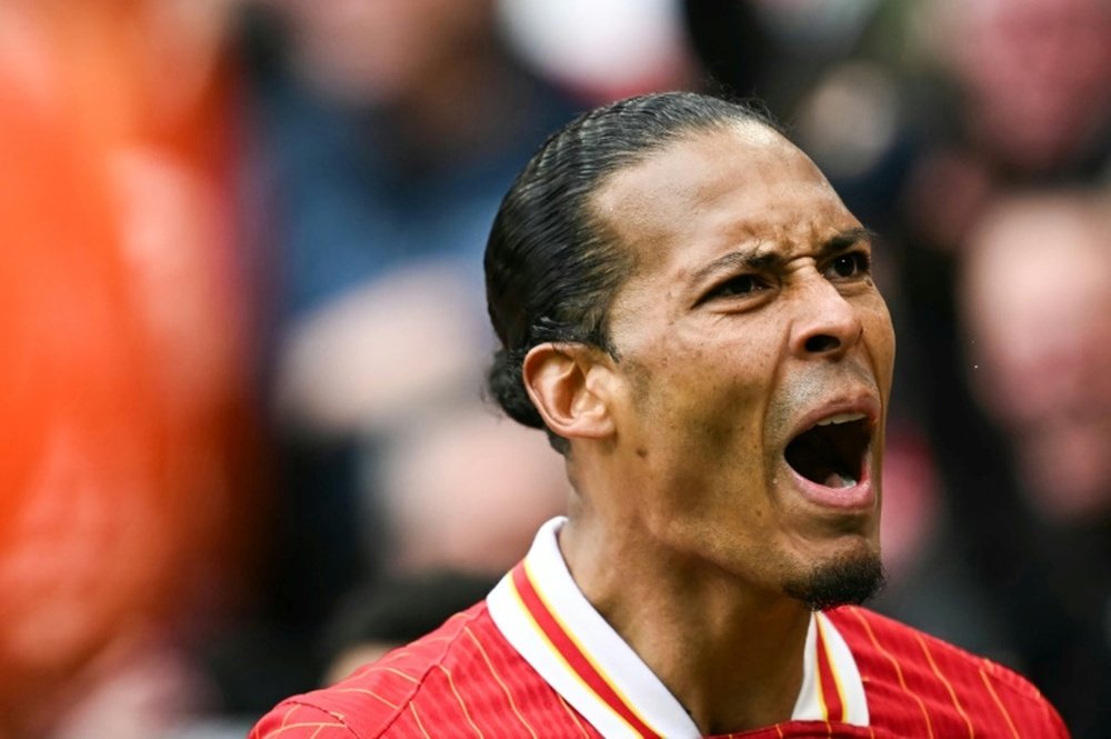 Van Dijk's late winner took Liverpool closer to the Premier League title. AFP