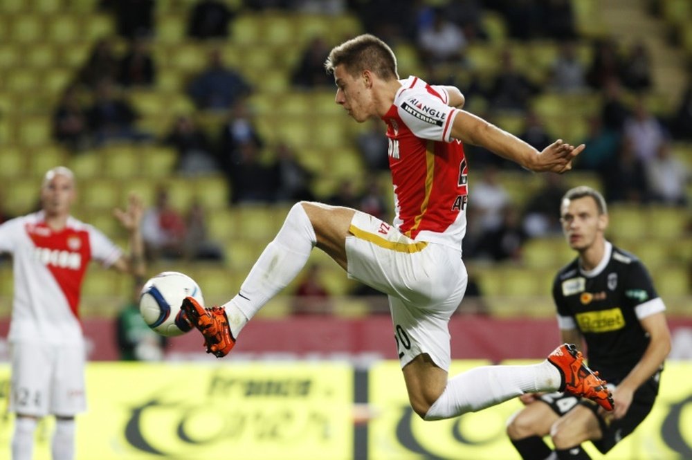 Monacos midfielder Mario Pasalic scores a goal during a French L1 football match against Angers on November 1, 2015, at the Louis II stadium in Monaco