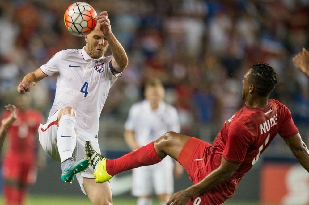 US captain Michael Bradley (L) claimed his 100th cap this year, becoming the fourth-youngest player to do so