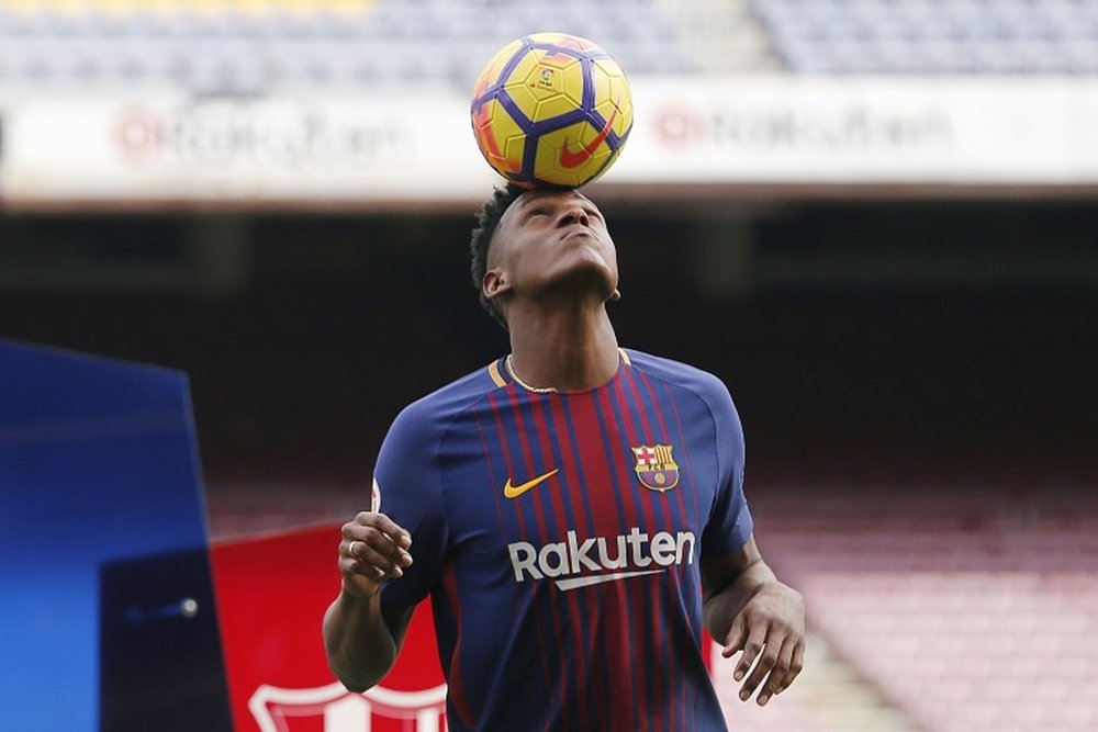 Mina pourrait quitter le Barça. AFP