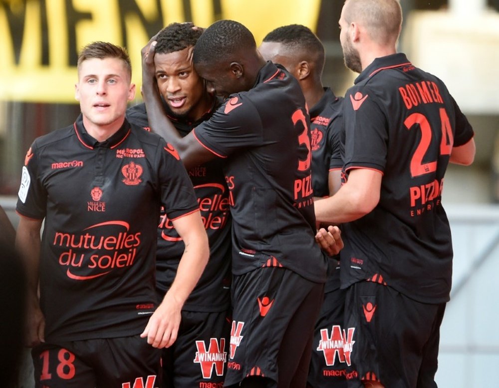 Nices players celebrate after scoring against Nancy. AFP