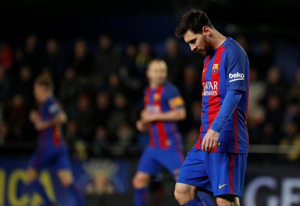 Messi's contract extension is causing Barca headaches due to financial rules. AFP