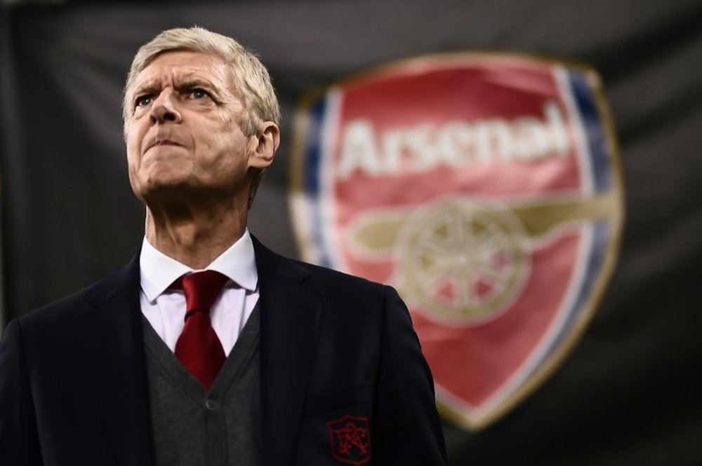 Wenger's future at the North London club is under threat. AFP