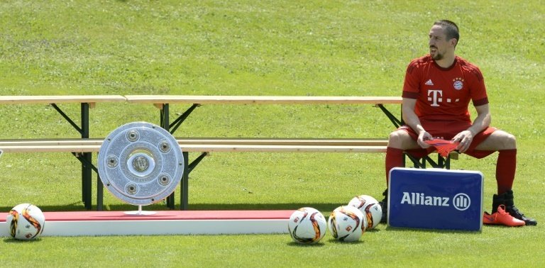 Injured Bayern Munichs French midfielder Franck Ribery waits for the German first division Bundesliga team FC Bayern Munich team photo presentation at the trainings area in Munich, southern Germany, on July 16, 2015