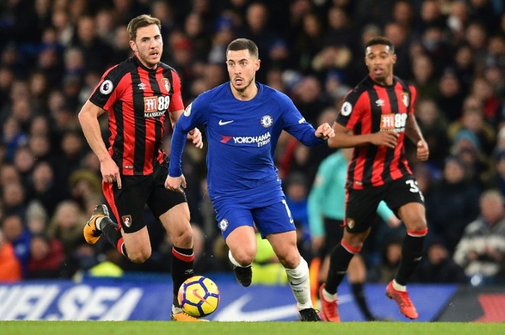 Hazard is still hopeful his team can win a trophy this season. AFP