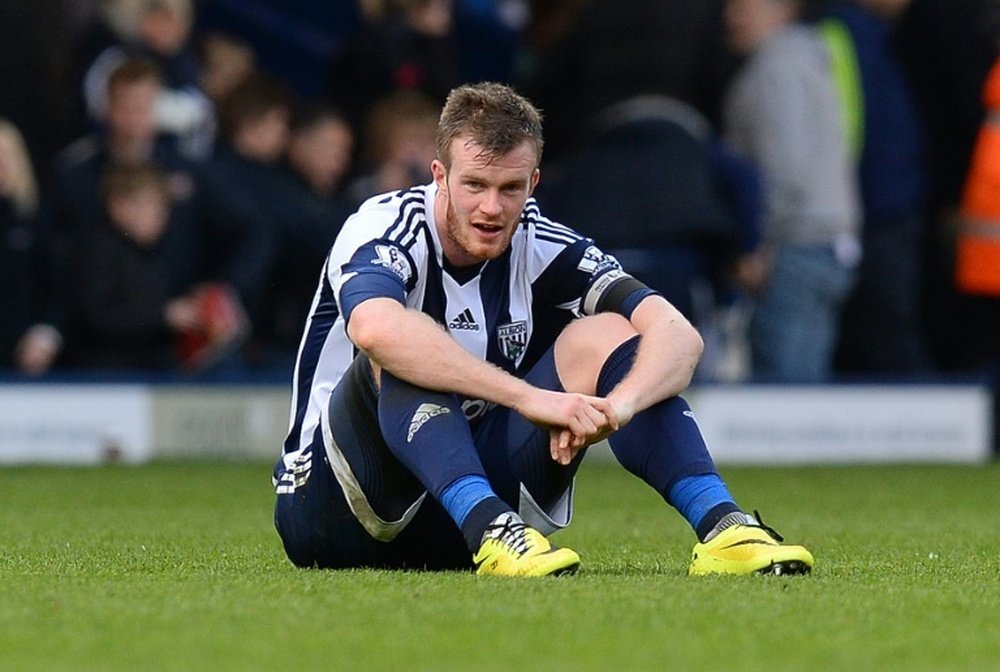 Chris Brunt (pictured) was struck by a coin as he went to applaud West Bromwich Albions travelling support following the Premier League clubs 3-1 FA Cup defeat at second-tier Reading on Saturday