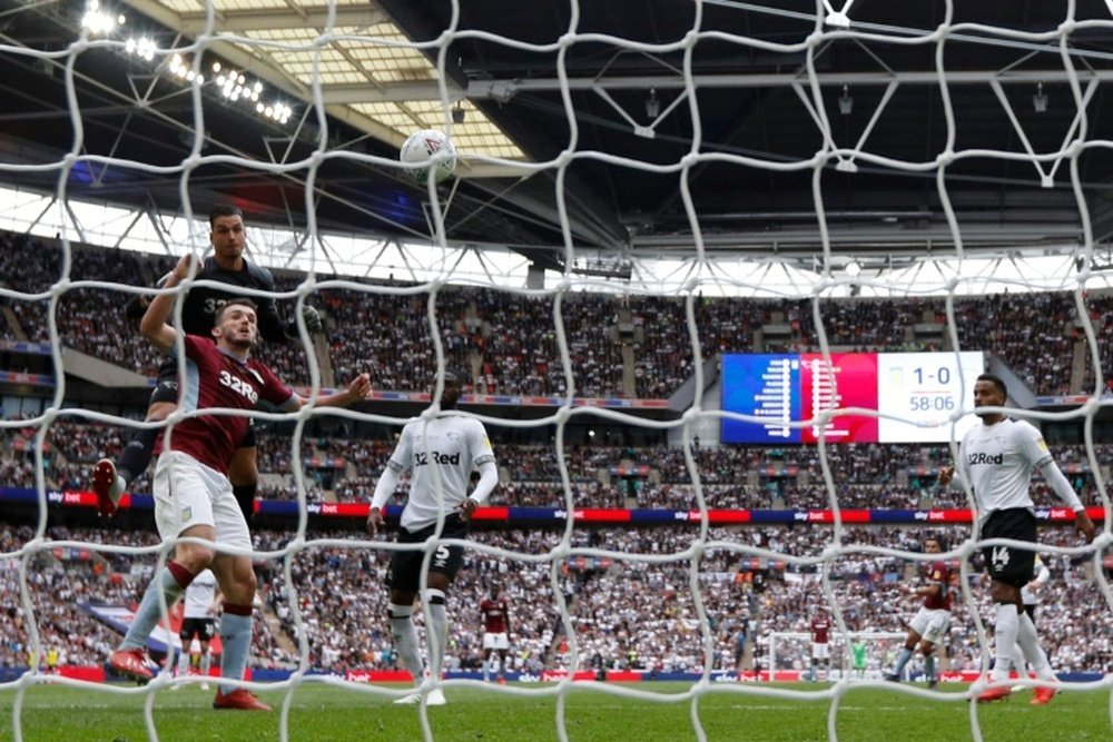 Aston Villa trust that they will keep McGinn. AFP