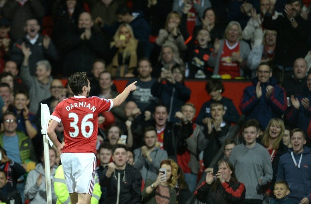 Manchester Uniteds defender Matteo Darmian celebrates after scoring during the English Premier League match against Crystal Palace at Old Trafford, on April 20, 2016