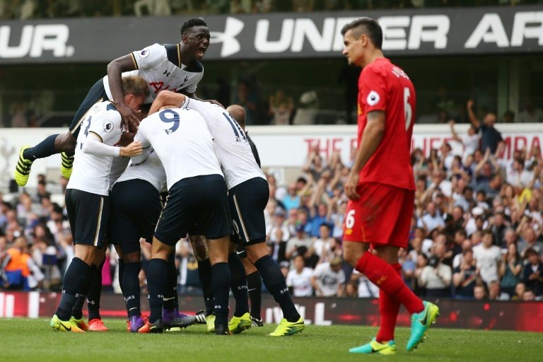 Wanyama (above) celebrates a Spurs goal. AFP