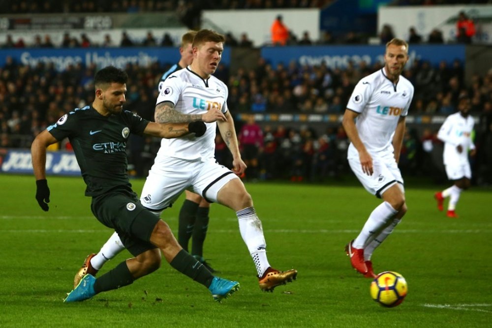 City e Swansea, frente a frente neste domingo. AFP