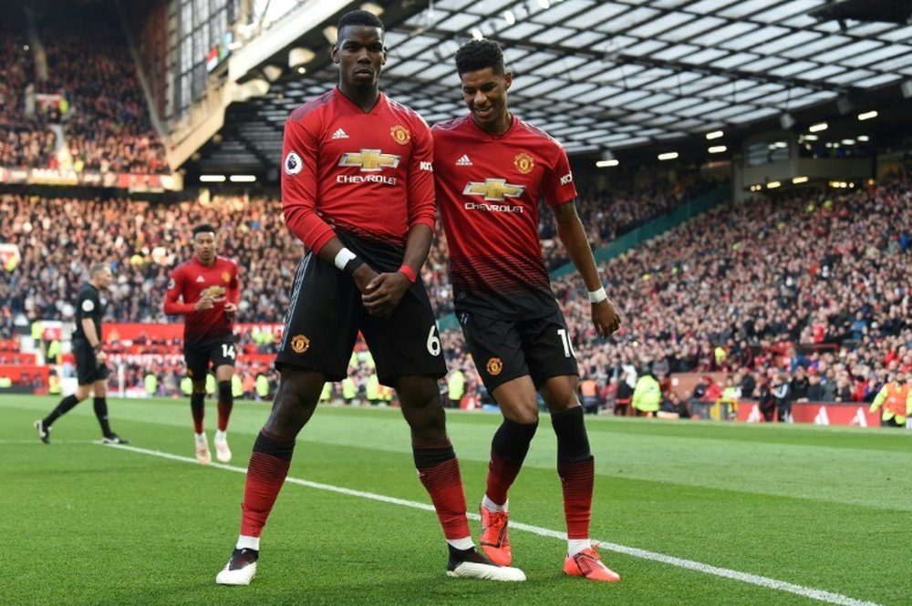 Manchester United could have Paul Pogba (left) and Marcus Rashford (right) fit for when the Premier League returns