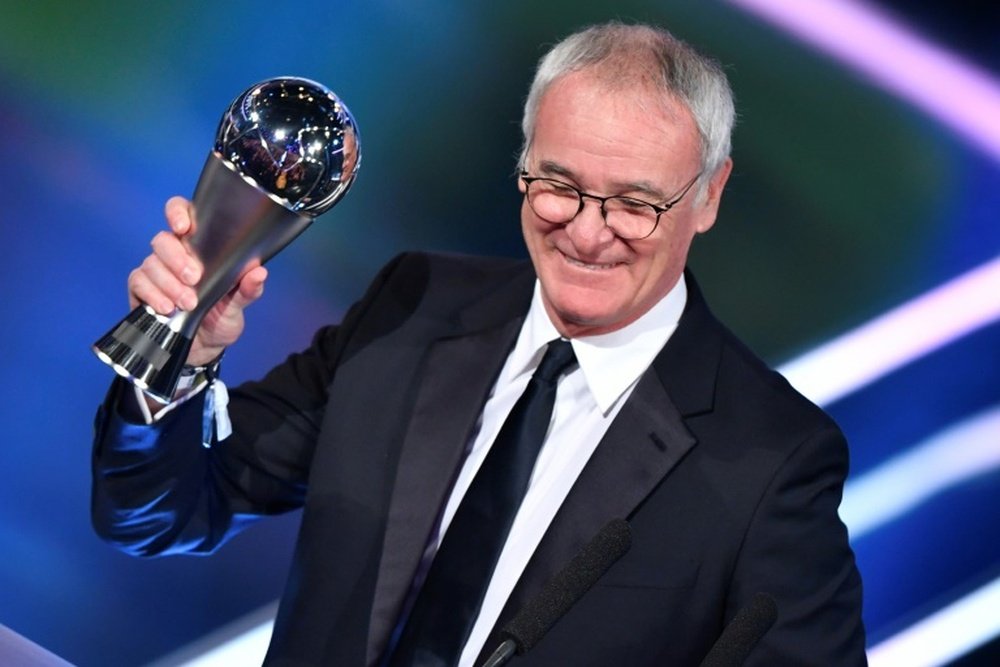 Ranieri receiving the award for FIFA Coach of the Year 2016. AFP