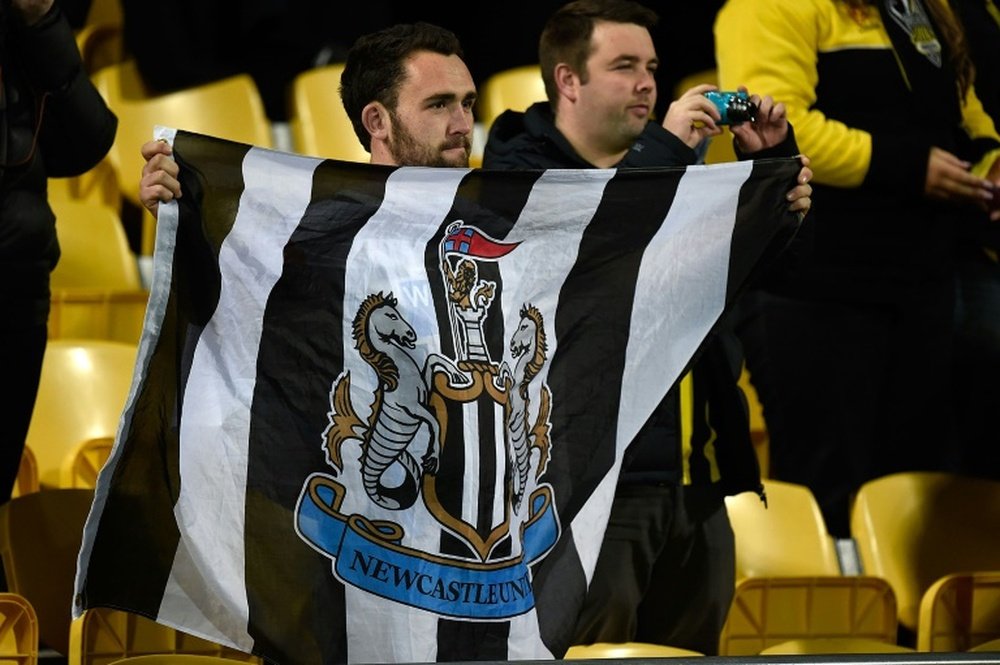 Newcastle fans are not happy with their ownership. AFP