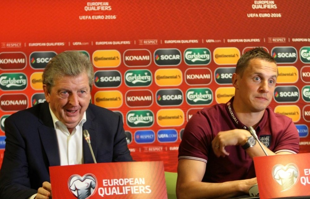 England manager Roy Hodgson (L) and defender Phil Jagielka attend a press conference in Vilnius on October 11, 2015, the day before their Euro 2016 qualifier against Lithuania