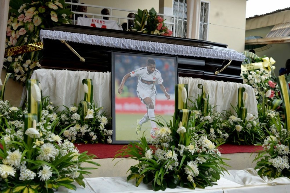 The casket and portrait of international soccer star Patrick Ekeng, who died after collapsing during a match in Romania, during his funeral in Yaounde on May 15, 2016