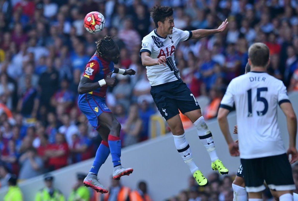 Pape Souare (left) and Son Heung-Min compete for the ball during Sunday's game