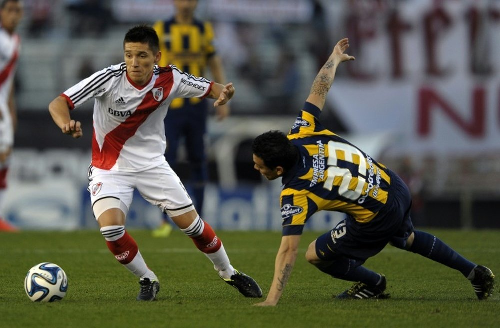 Argentinas Matias Kranevitter (L), pictured here playing for River Plate in 2014, will join Atletico Madrid in December