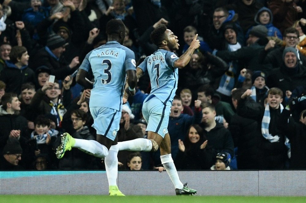 Sterling celebrates scoring against Arsenal. AFP