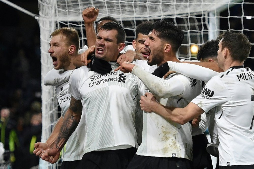 Klavan's historic goal edges Liverpool past Burnley. AFP