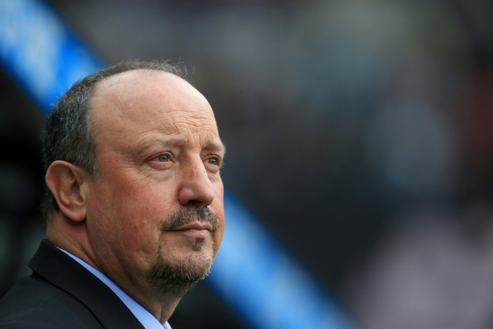 Benitez's relationship with the owner is very strained. AFP