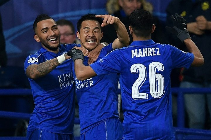Leicester into Champions League last 16 thanks to Okazaki and Mahrez goals
