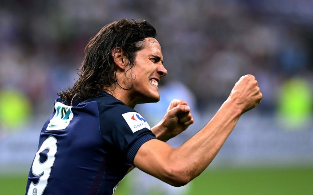 Paris Saint-Germain forward Edinson Cavani celebrates after scoring during the French Cup final against Marseille at the Stade de France in Saint-Denis, north of Paris on May 21, 2016