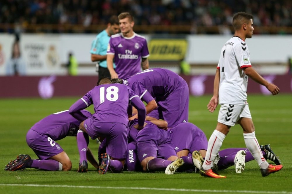 Real Madrid players celebrate a goal against Cultural y Deportiva Leonesa. AFP