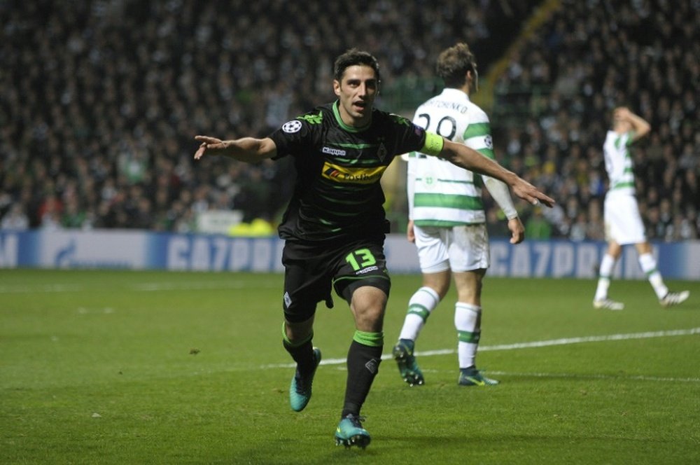 Monchengladbach midfielder Lars Stindl celebrates scoring his teams first goal against Celtic. AFP