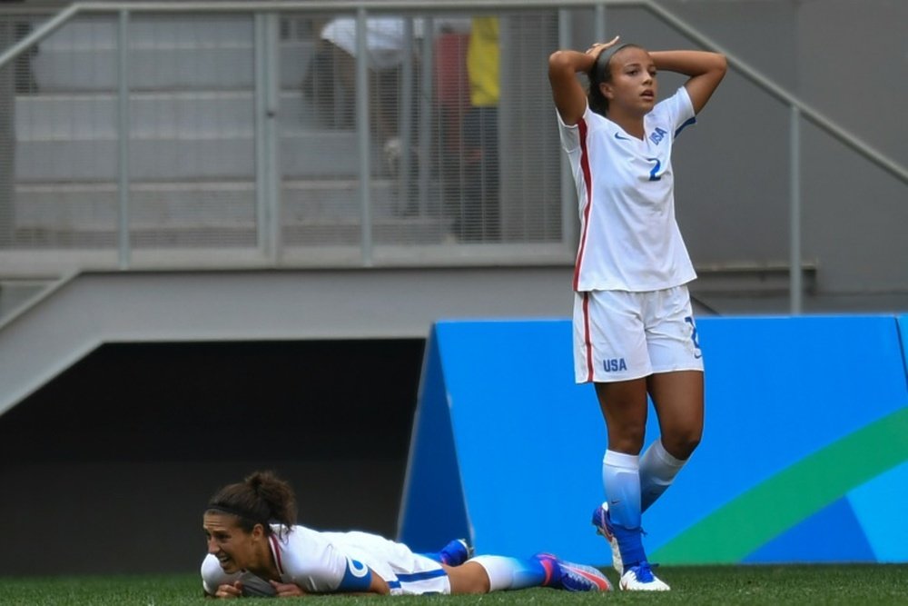 USAs Mallory Pugh (R) and Carli Lloyd react during the Olympic Games quarter-final womens football match vs Sweden, on August 12, 2016