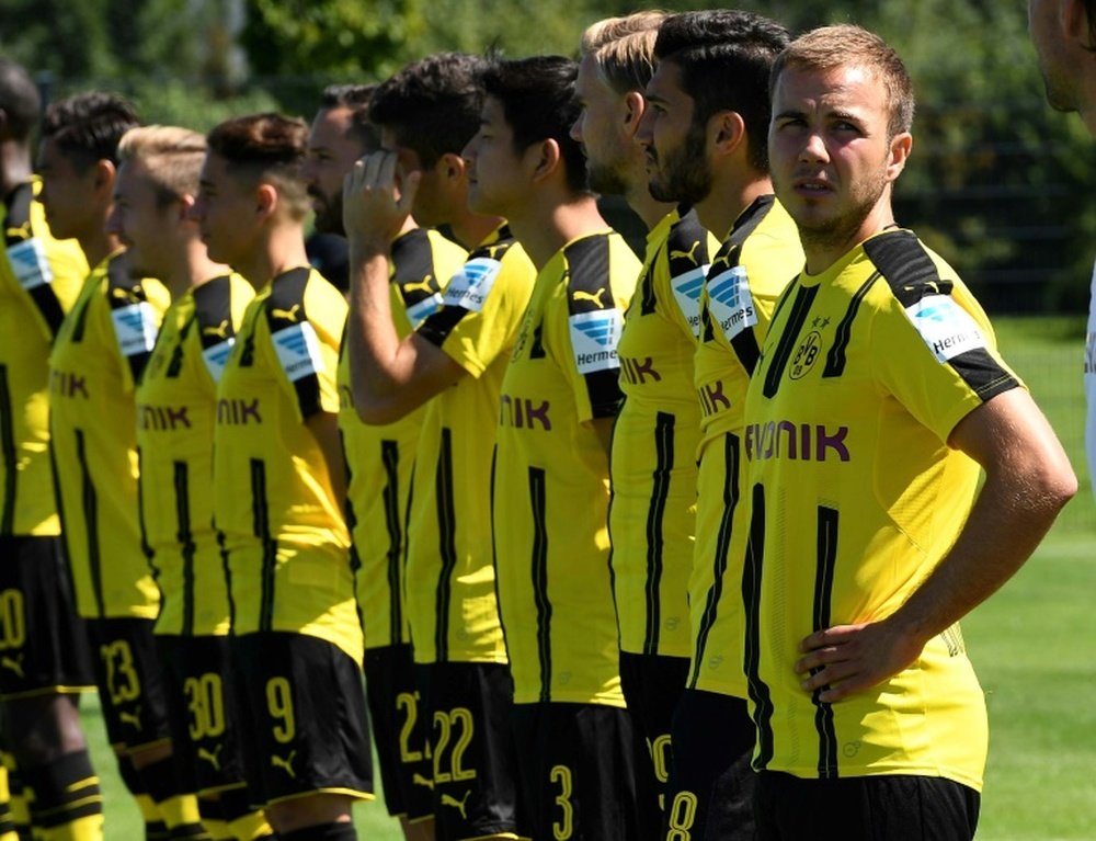 Borussia Dortmund players line up during a team presentation ahead of the new Bundesliga season, in Dortmund, western Germany, on August 17, 2016