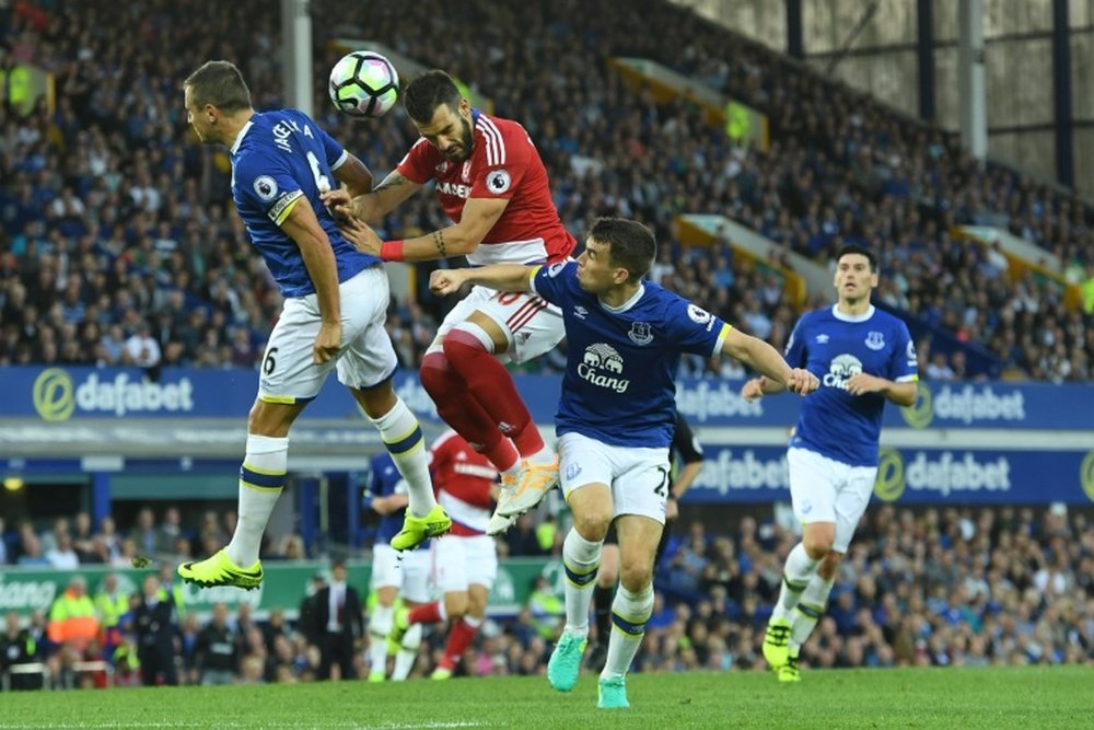 Jagielka challenges Boro's Alvaro Negredo in Everton's 3-1 win on Saturday. AFP